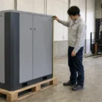 業務用コンプレッサーの搬入スペースを確認する作業