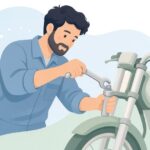 バイクのフォークキャップをレンチで外す様子をイメージしたイラスト