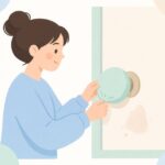 ドアノブに傷防止カバーを付ける様子をイメージしたイラスト