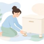 家具の脚に高さ調整パッドを入れる様子をイメージしたイラスト