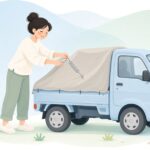 軽トラックの幌を固定スプリングで留める様子をイメージしたイラスト