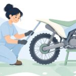オフロードバイクのサグを測定する様子をイメージしたイラスト