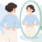 ズボンのウエストを延長ボタンで広げる様子をイメージしたイラスト