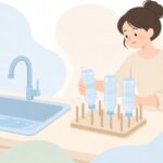 ペットボトルを水切りスタンドで乾かす様子をイメージしたイラスト