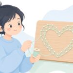 板に釘と糸でストリングアートを作る様子をイメージしたイラスト