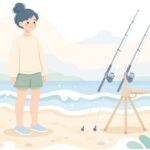砂浜で三脚の竿受けに竿を立てる様子をイメージしたイラスト