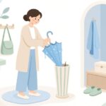 玄関の傘立てに傘をしまう様子をイメージしたイラスト